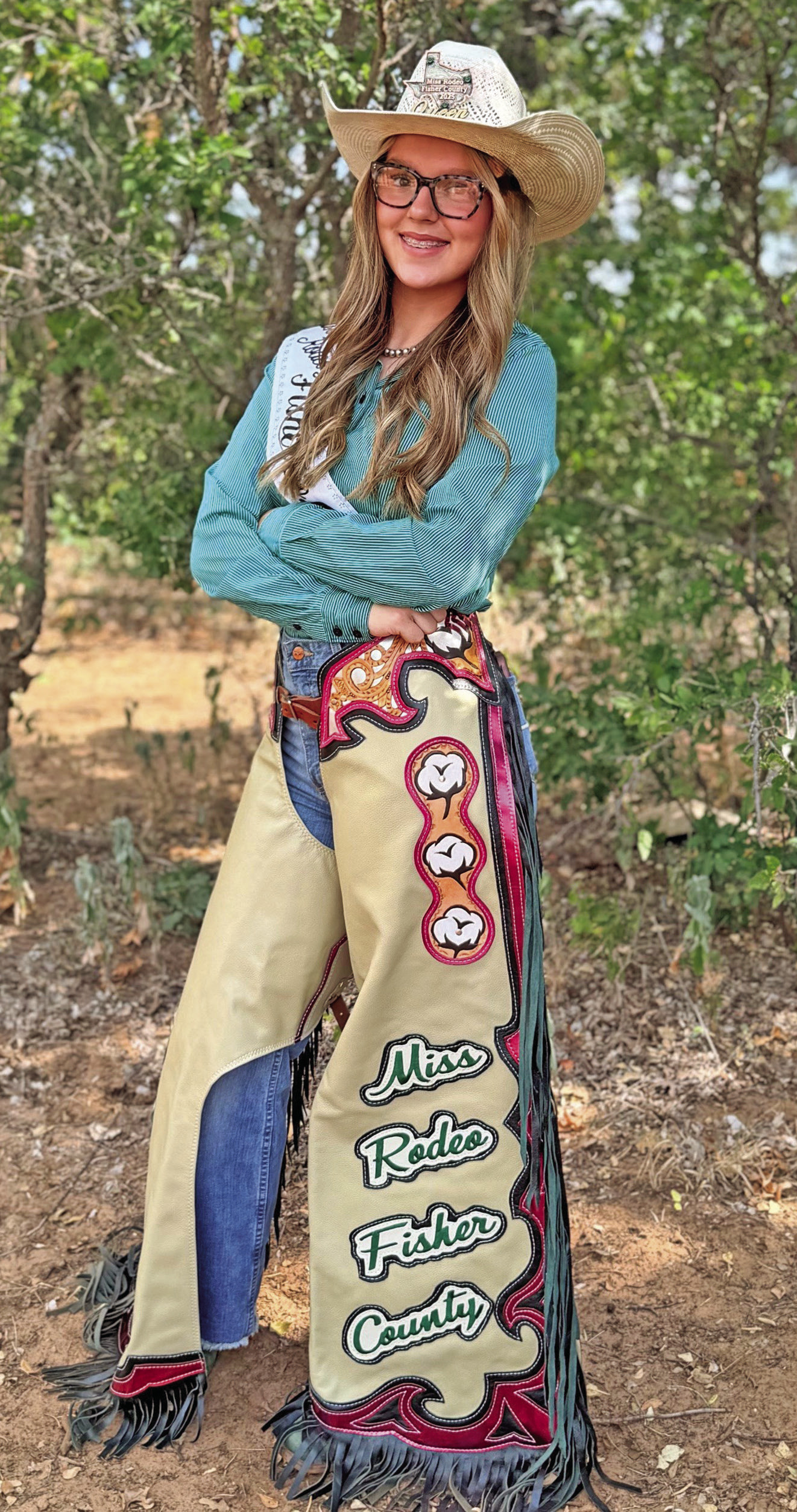 2025 FCFR Queen Berklee Pippin showing off the chaps that will be passed down to the 2026 Rodeo Royalty Court