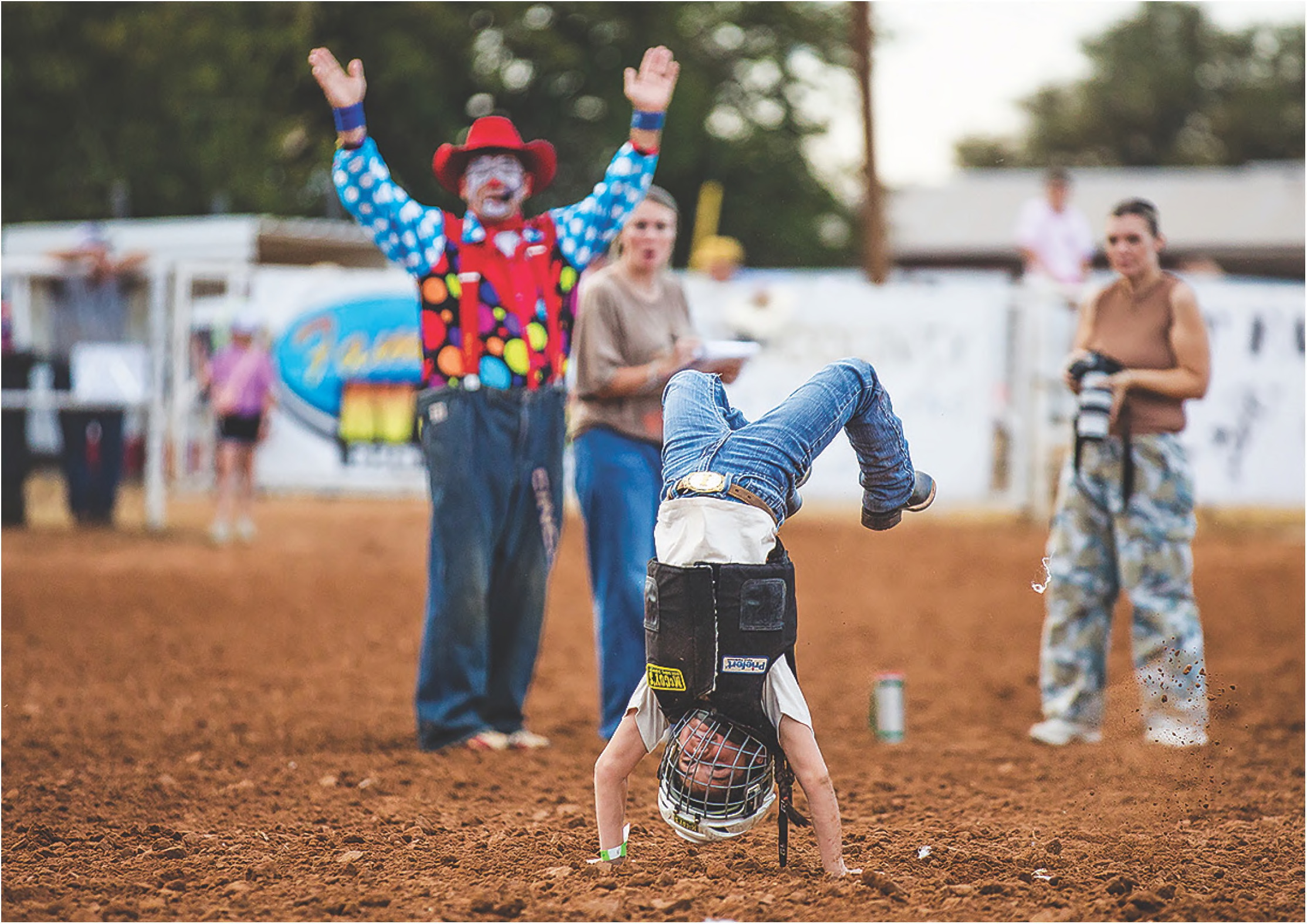 Izzy Boyd, daughter of Daniel Boyd, goes head over heels during Thursday night’s mutton bustin’ preliminaries at the 82nd annual Fisher County Fair and Rodeo. Boyd went on to finish third overall In this year’s mutton bustin’ competition, earning $500 sponsored by ROXO Energy. photos by mark martinez