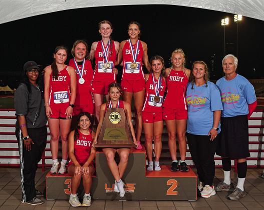 Lady Lions proudly hold their 2nd State Title in Track &amp; Field - Back Row: Coach Kim WIlliams, Saylor Smith, Callie Hernandez, Taylor Jeffrey, Hailee Garmer, Lilly Benson, Brylie Duniven, Coach Jolana Calhoun, Coach Rob Londerholm. Sitting Emma Carreon and Chasity Benson, ( PHOTO BY JIM PARKER WWW.JIMPARKERPHOTOS.COM)