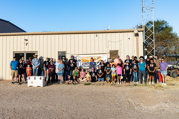 A small group of volunteers gathers early Saturday morning before heading out to their assignments during Rotan’s first community-wide cleanup day. More than 140 volunteers ultimately participated, tackling projects across town and helping remove approximately 300 cubic yards of debris. Photos by Mark Martinez.