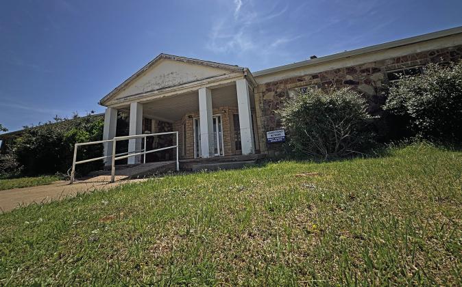 Overlooking Rotan's downtown for nearly 100 years, the new owners of the old Callan Hospital are looking at ways for the building to continue serving the community after city council members approved the sale in early April.