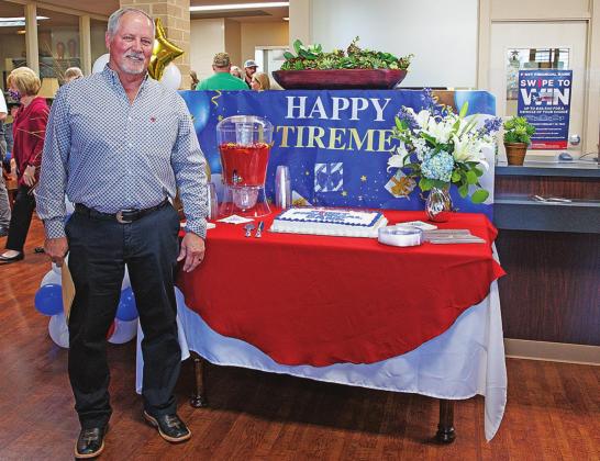 After more than 26 years of service, long-time banker Britt Stuart bids fairwll to the Roby branch during his retirement party last Thursday.