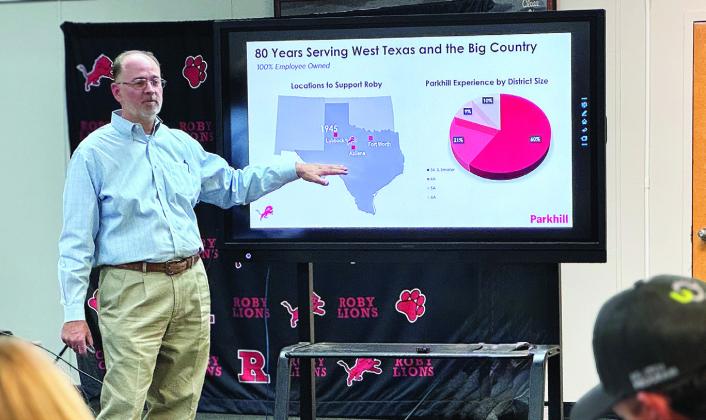 Parkhill partner Allan Wolf, a bond-planning specialist, outlines the firm's 80 years of experience working with school districts across the region during Roby CISD's Sept. 23 special-called meeting.
