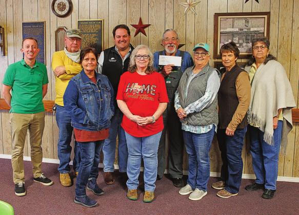 The Stonewall County Senior Citizen Board along with Stonewall County Attorney Riley Branch and Peregrin Petroleum representative, Reed Young