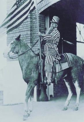 R.L. Penick, early Stamford mayor and often called the “Father of Stamford,” rides out of Stamford City Hall’s fire station in a magnificent early scene of local boosterism .