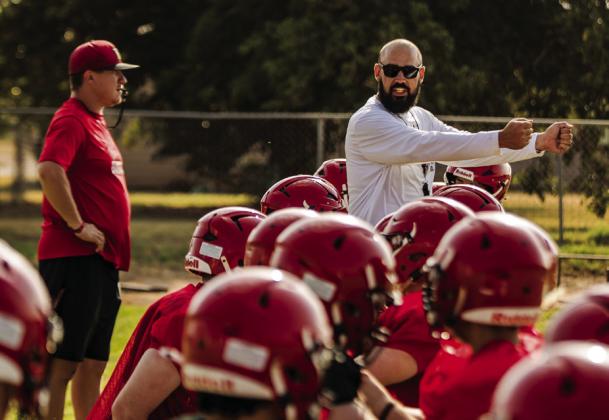 Roby Head Coach Zane Graves leads his team through pad drills at morning practice. Photo by Mark Martinez.
