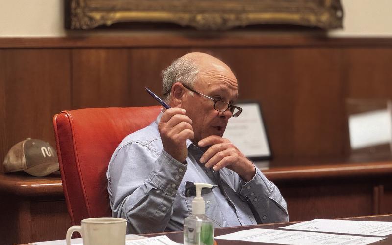 Stonewall County Commissioner Gary Myers speaks during a Commissioners Court meeting as officials consider a proposed tax abatement agreement with Crusoe for a planned data center project. PHOTO BY JEFF HURT