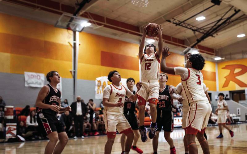 Rotan Senior Chris Newton goes up for rebound during the Hammers senior night match against Aspermont last Tuesday night. Photo by: Mark Martinez