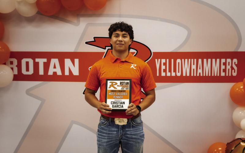 Boys Cross Country MVP Cristian Garcia. Not pictured: Girls Cross Country MVP Belle Turner.