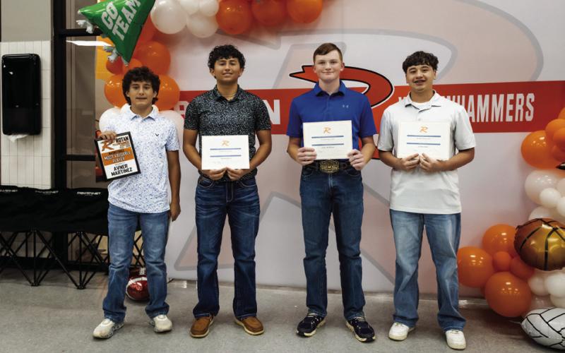 Boys Basketball Awards L-R: Overall MVP - Avner Martinez, Most Improved - Sebastian Garcia, Defensive MVP - Tucker McWilliams, Offensive MVP - Joshua Lujan