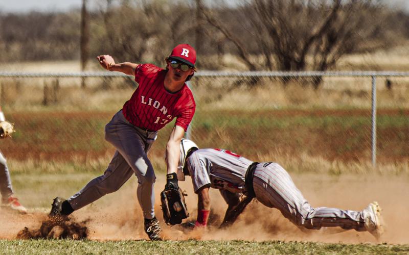 Roby's Kullen Daniel snags a throw to second during the Lion's tourney match with Iraan. PHOTO BY: MARK MARTINEZ
