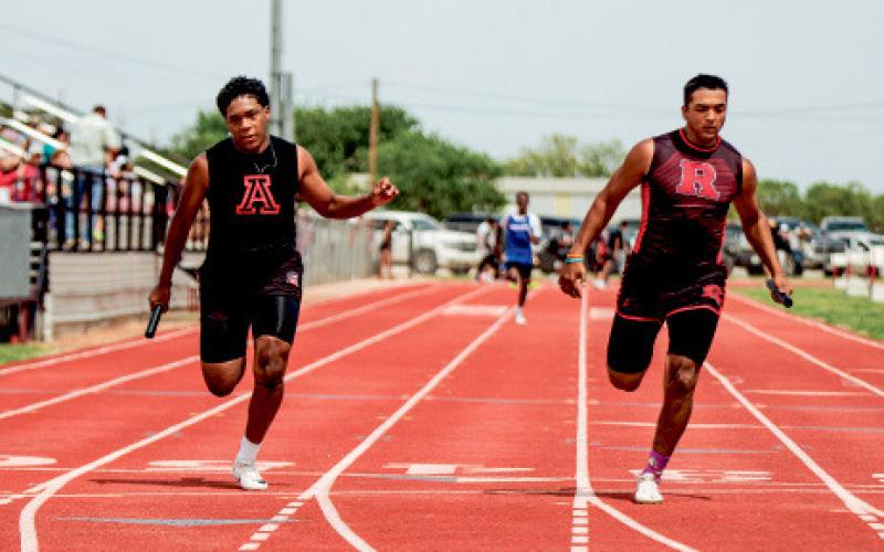 Aspermont’s Isaiah Johnson (left) &amp;amp; Roby’s Gabriel Cerveny (right) cross the finish line during 4x100 Relay.