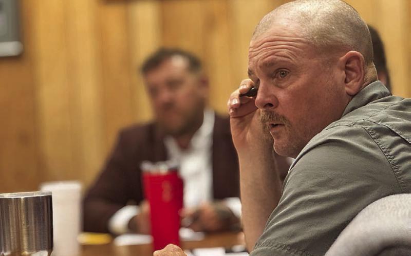 Aspermont City Council Member Cody Myers listens as city administrator Lorenzo Calamaco explains the request to access the city’s wastewater treatment plant from Wilda Beast LLC and his recommendation of a fee that would generate roughly $4,200 in revenue. PHOTO BY JEFF HURT