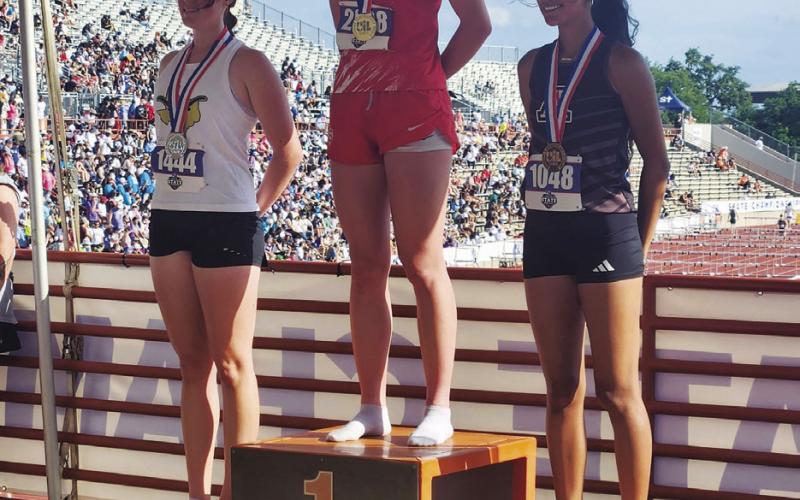 Aspermont Sophomore Emilee Silva on the medal stand after claiming the Bronze in the 100M Hurdles at the UIL State Track &amp;amp; Field Meet in Austin this past Saturday. In addition to recieving a medal, Silva also achieved a new PR in the event with a time of 15.97. Courtesy Photo