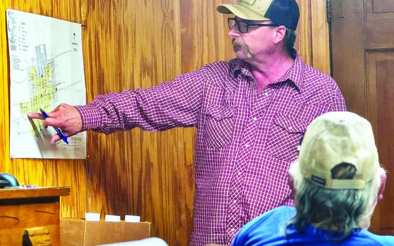 Roby City Manager Jack Brown points to troubled water delivery areas that are expected to be replaced should the city be awarded funding. PHOTO BY JEFF HURT