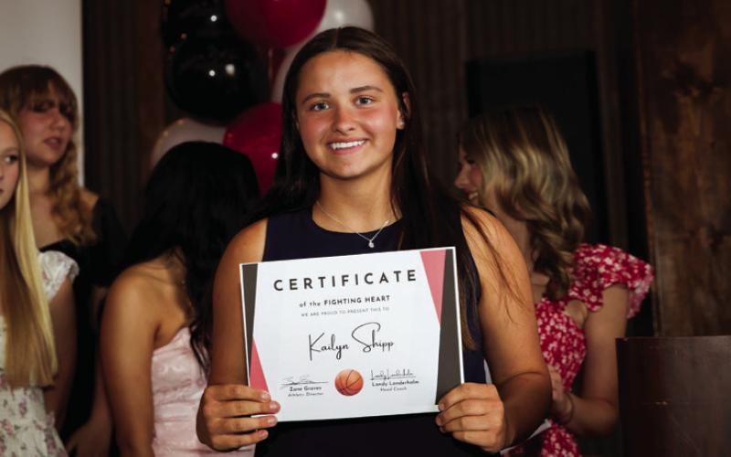 Soph. Kailyn Shipp recieves the Lady Lion Basketball Fighting Heart Award.