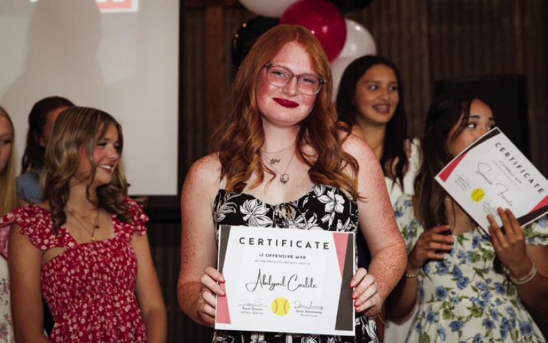 Jr. Abigail Carlile recieves the Lady Lion Softball Offensive MVP Award.