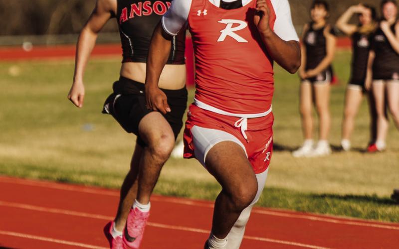 Rotan's Chris Martinez running the 200 M Dash. PHOTO BY: MARK MARTINEZ