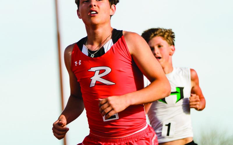 Rotan's Chris Newton finishing 1st in the 3200M Run. PHOTO BY: MARK MARTINEZ