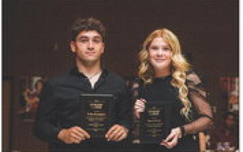 Seniors Kolby Bradshaw &amp;amp; Matti Polk recieving the A.I.S.D. Student of the Year Award.