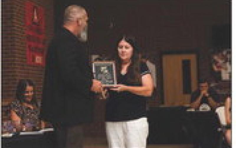 Debra Smith Awarded A.I.S.D.’s Booster of the Year .