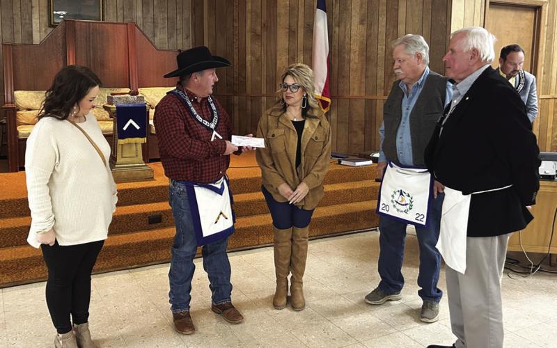 Masons donate funds for children’s advocacy