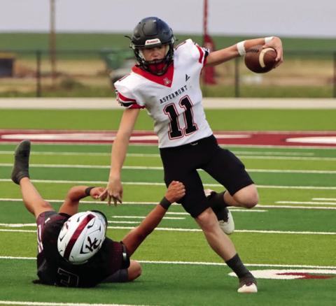 Left: Aspermont's Graden Rabel breaks a tackle before cutting up the sideline during the Hornets game vs. Klondike last Friday.