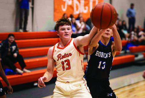 Rotan's Tucker McWilliams fights for a loose ball during the Hammers' 38-34 win over the Rule Bobcats last Friday. Photo by: Mark Martinez
