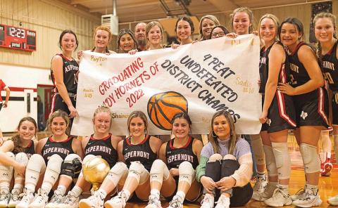 District Champion Lady Hornets Top L-R: Addi Shugart, Tatum Polk, Lauren Rojas, Coach Pat Potts, Mylee Van Meter, Jessi Rabel, Coach Tiffany Potts, Mikayla Daniel, Shelby Martin, Raelyn Bradley, Peyton Calamaco, Kelly Lowack. Bottom L-R: Amilia Hecht, Celie Gentry, Payton Potts, Sadie Gentry, Patricia Murguia, Shaincey Polk.