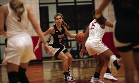 Roby sophomore Lilly Benson looks for an open teammate during Lady Lion's 23-41 loss to Anson on Tuesday night.