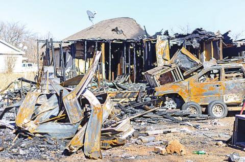 . Smoldering remains of the historic Roby home that was detroyed on December 23, 2021. Photo by: Mark Martinez