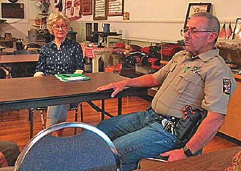 President Dot Harris and others enjoyed Sheriff Randy Ford's presentation at the Fisher County Historical Commission's October 5th meeting.