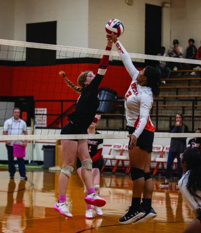 Lady Hornet Mylee Van Meter &amp; Lady Hammer Sierra Williams battle at the top of the net. The Lady Hornets will have tune up match against Albany this Saturday at 10am, while the Lady Hammers will play for Bi-district Monday, Oct. 31st against Trent.
