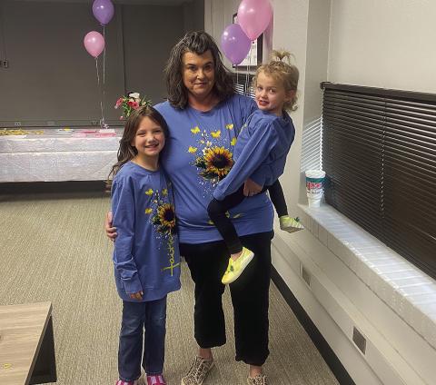 Proud mom, Sherrie Davis, along with her two daughters, Jahzlyn and Acelyn after Tuesday's adoption proceeding at Rotan ISD.