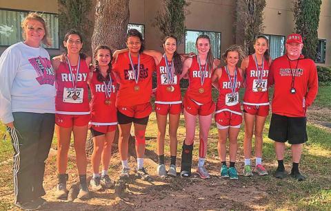 State qualifying Roby Lady Lions Cross Country Team L-R: Coach Jolana Piske, Ivy Espinzoa, Lilly Benson, Joselynn Williams, Hailee Garmer, Callie Humphrey, Chasity Benson, Hope Garmer, Coach Michael