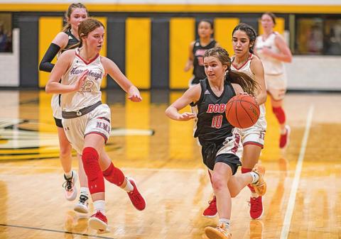 Roby's Lilly Benson races down the court last Thursday during the Lady Lions' 25-55 loss to Hermleigh. Photo by: Mark Martinez