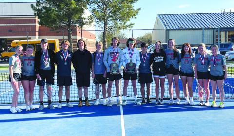Aspermont Tennis Team L-R: Mylee Van Meter, Regan Polk, Jasper Hoppe, Jack Bell, Jaden Flores, Keltyn Van Meter, Kade Morris, Wesley Koenig, Carson Guidry, Addi Shugart, Jessi Rabel, Lizbeth Garcia, Kenzy Blankenship, Emily Blankenship. The Hornets along with claiming the team championship, also took 1st boys doubles. The team will compete at Regionals in San Angelo taking place on April 10-11. COURTESY PHOTO