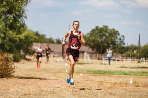 Roby Junior Camden Lummus leads the pack during the boys division of the Hamlin Invitational cross country meet last Wednesday. Roby, Rotan, &amp; Aspermont runners competed. Among some performances of note, Lummus finished 1st as an individual, the Aspermont boys finished 8th as a team, while the Roby Girls finished 5th overall as a team respectively. With two weeks left before district, our local teams are next set to compete this week at the Rotan Invitational meet. PHOTOS BY: MARK MARTINEZ
