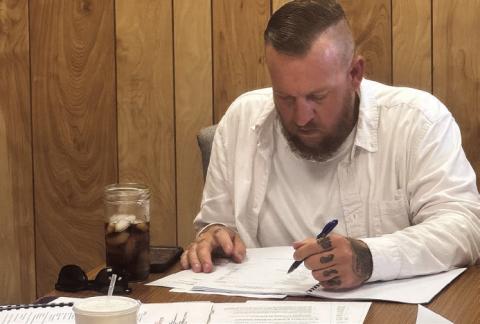 Aspermont Mayor Steven Ellis follows along while the council reviewed the city’s annual financial report, showing that while some losses were realized, the city remains on solid financial ground. PHOTO BY JEFF HURT
