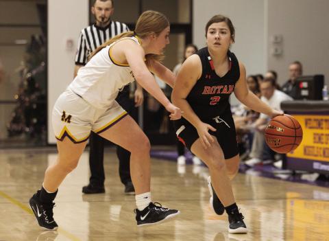 Lady Hammer junior Hayden Foster looks for open teammate during Rotan's close 47-52 loss to the Lady Moguls.