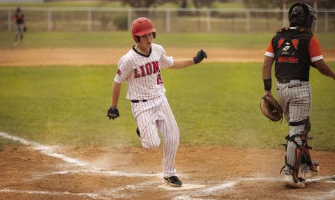 Roby's Houston Few crosses home plate to score during the Lion's 4-20 loss to the Ira Bulldogs this past Monday. Photo by Mark Martinez