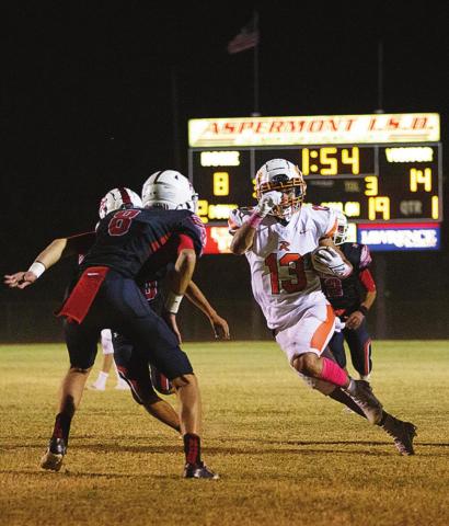 Rotan Junior Jaxon Warren rushes into Hornet defense toward the endzone in last Friday's win over Aspermont. Photo by: Mark Martinez