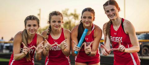 The Roby Lady Lions Mile Relay Team of Lily &amp; Chasity Benson, Hailee Garmer, and Taylor Jeffrey, are all smiles after finishing first at Jayton's Rolling Plains Relays last Friday. 14 teams competed at the meet, with the defending State Champion Lady Lions coming out on top in the Girls Division. PHOTO BY MARK MARTINEZ