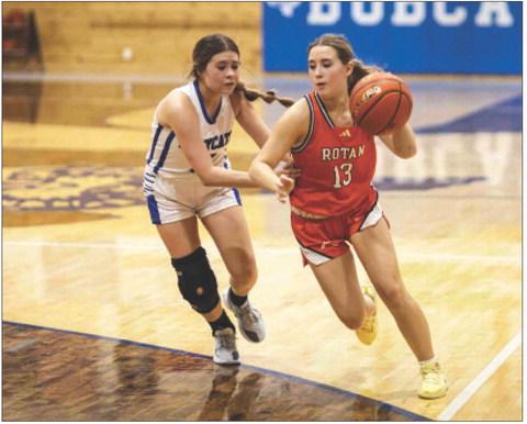 Rotan's Avery Gonzalez begins to drive towards the basket during the Lady Hammers 45-22 win over Rule last Thursday night. Photo by: Mark Martinez