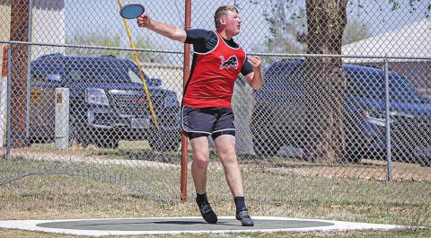 Roby Senior Jake Byers throwing the Discus.