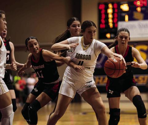 Lady Hornets Emilee Silva (left) &amp; Maleah Hecht (right) battle with Lady Horns for a loose ball. Photo by: Mark Martinez