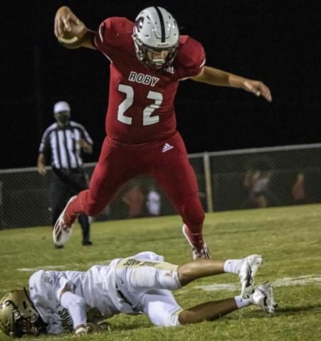 Ethan Hernandez leaps over Jaybird in Friday's 48-0 loss against Jayton