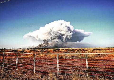 Firefighters battle Stonewall County blaze
