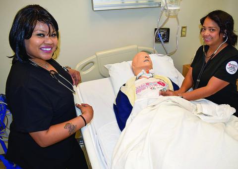 TSTC Vocational Nursing students Chrystal Thomspon (left) and Amy Zavala are learning ways to help patients suffering from a heart condition. February is annually observed as American Heart Month. (Photo courtesy of TSTC.)