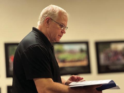 Auditor Mike Edgin of Edgin, Parkman, Fleming &amp; Fleming, PC, reviews Aspermont ISD’s 2024–25 financial report during the district’s November meeting, highlighting strong reserves and improved year-end performance. PHOTO BY JEFF HURT